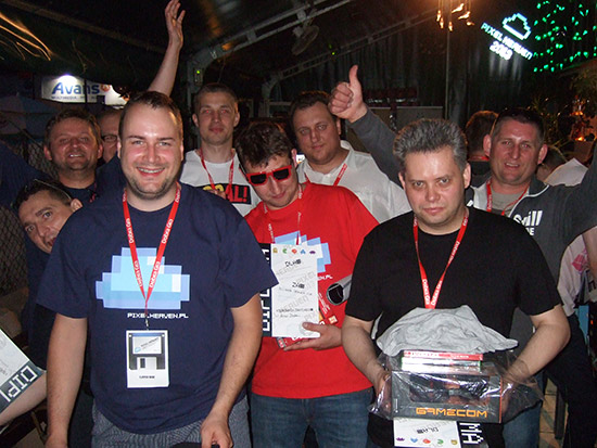 Tournament participants congratulate the top three: (L-R) Daniel, Paweł and Konrad, with their prizes