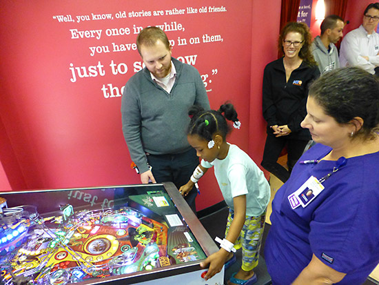 The children get to enjoy the new pinball