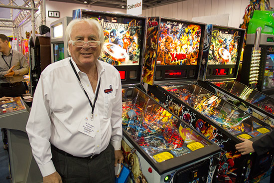 Gary Stern at the EAG International show with two The Avengers machines