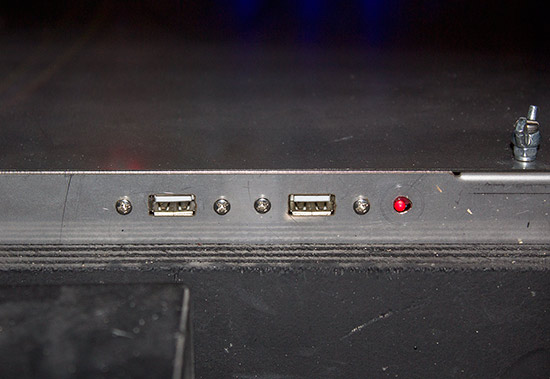 Two USB ports on the front of the metal box