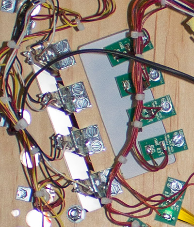 The K-I-S-S targets, insert and LEDs under the playfield