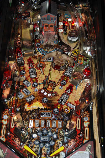 Playfield overview, showing the well walker before the prison, blocking right flipper shots