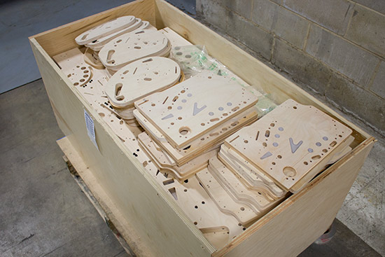 A box of unprinted playfields and mini-playfields