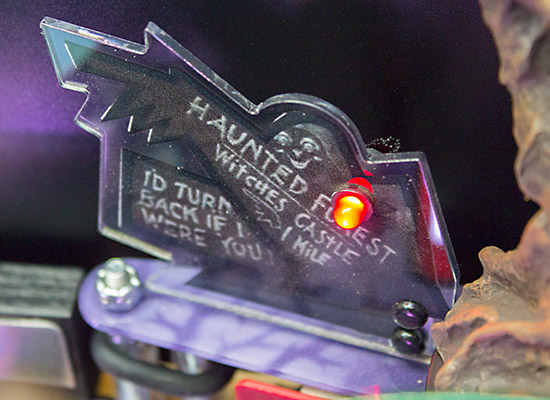 The Haunted Forest sign with a rather awkward-looking red LED