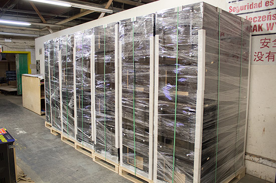 Stacks of pinball cabinets ready to ship to a local pinball manufacturer
