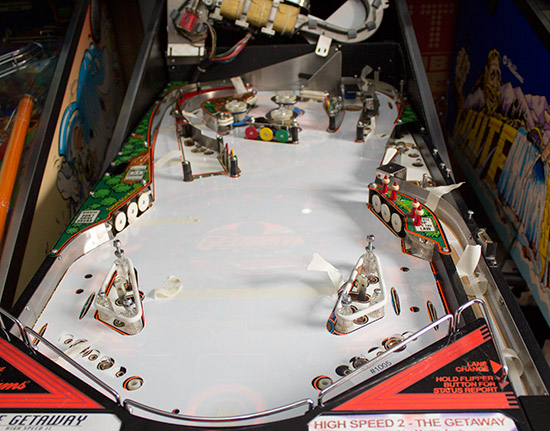 The playfield protector with the backing film removed