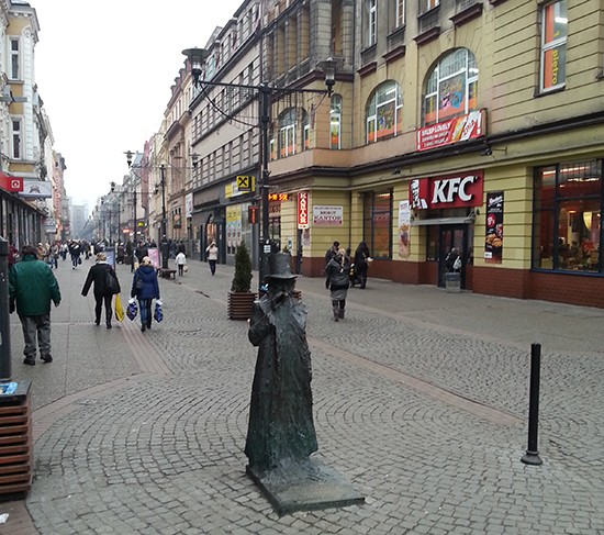 Dworcowa Street in Bytom with the Świetlik statue