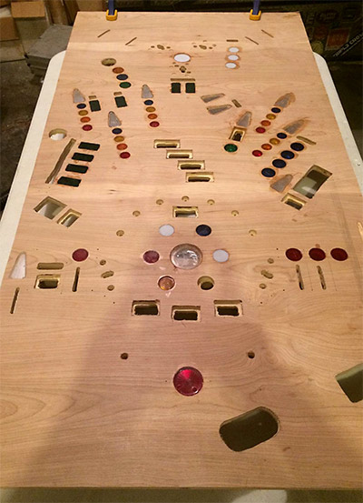 A prototype playfield being populated with inserts