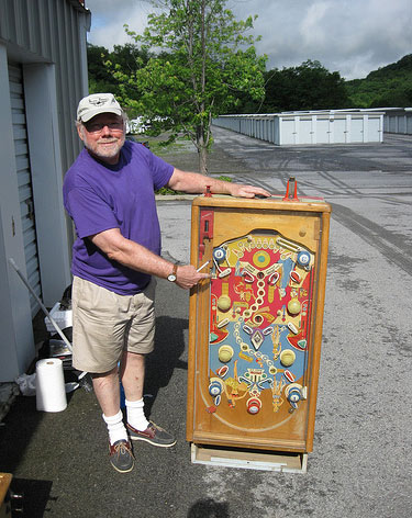 Gordon with a 1948 Gottlieb Ali-Baba game from one of his storage units