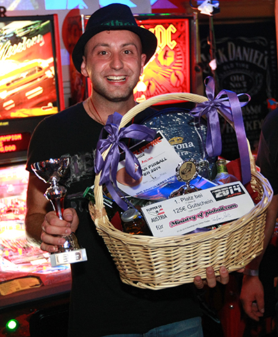 Daniele with his winner's basket of prizes