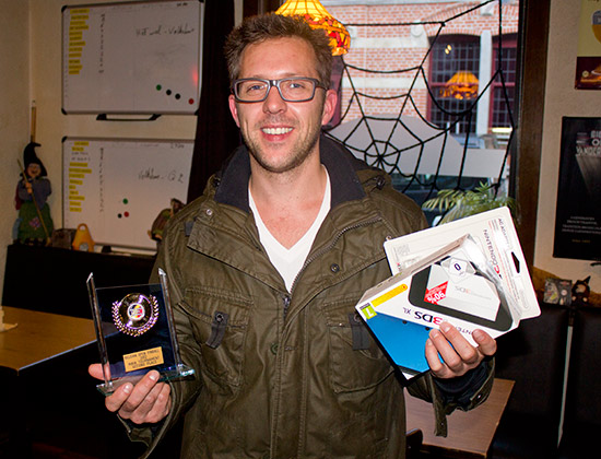 Second place, Taco Wouters with his prize of a Nintendo DS system