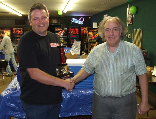 Mike accepts his Saturday Night Pinball winner's trophy