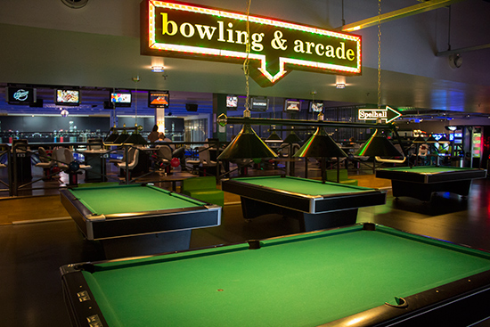 The pool tables, with the bowling lanes behind