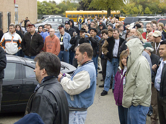 Visitors wait for the tour to begin
