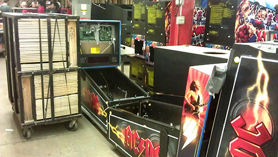 Decaled AC/DC and X-Men cabinets and playfields