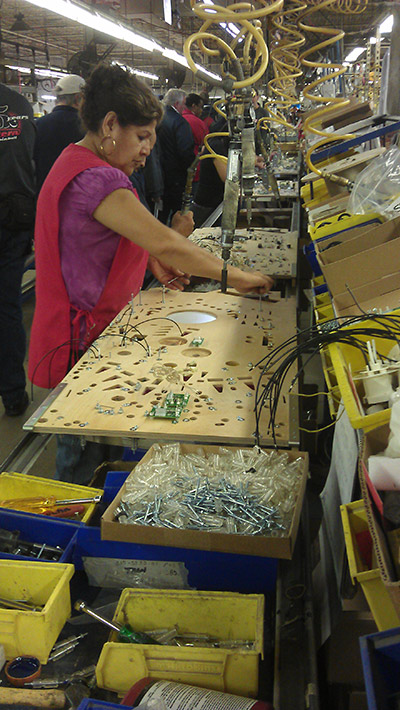 Meanwhile, on the right of the cabinet line, the playfield line adds more components and assemblies