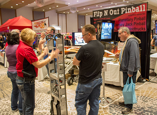 Behind ColorDMD was the Flip N Out Pinball stand featuring the Escalera hand trucks and lifters