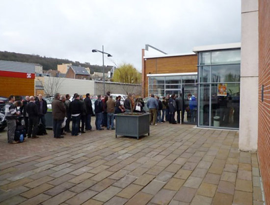 Many people were queuing before the doors opened