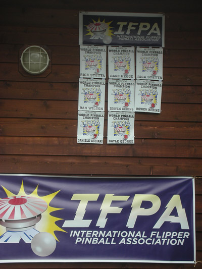 The list of former IFPA World Champions are displayed on the wall