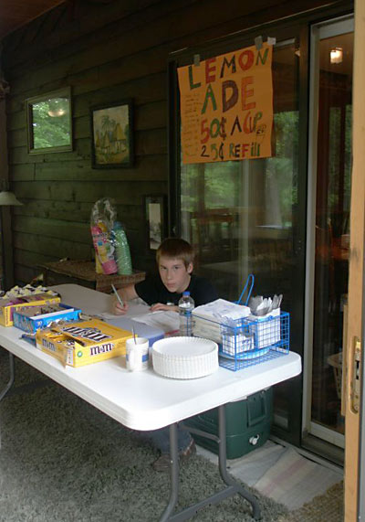Keegan at the candy and goodies table