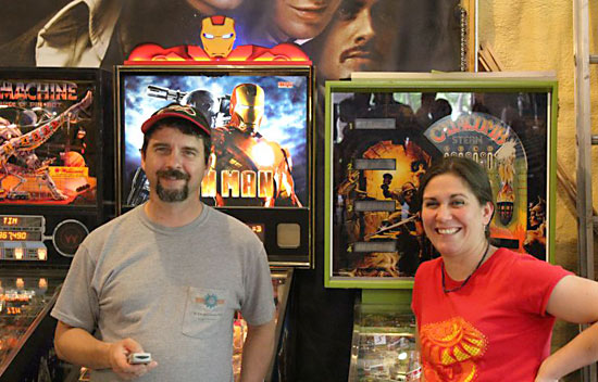 Trent Augenstein and Karen Culp enjoying the practice area bank of games (notice the cool lighted Iron Man topper by Matt McKee)