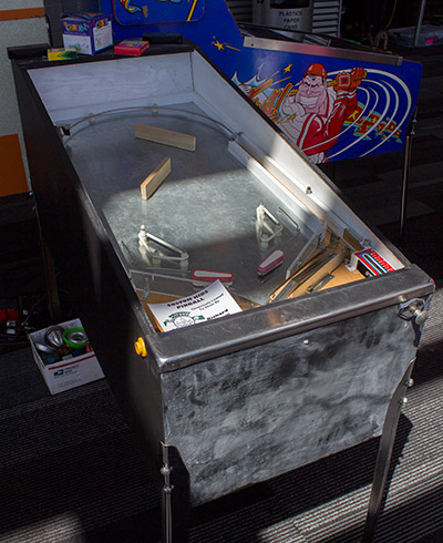 This custom pinball allows kids to explore what's under the glass