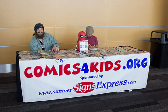 Out in the lobby, Comics 4 Kids were promoting comic books with free giveaways
