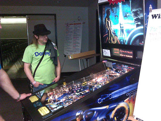 Les Bond from Dorky's Arcade in Tacoma checks out the new Tron pinball machine he hopes to win
