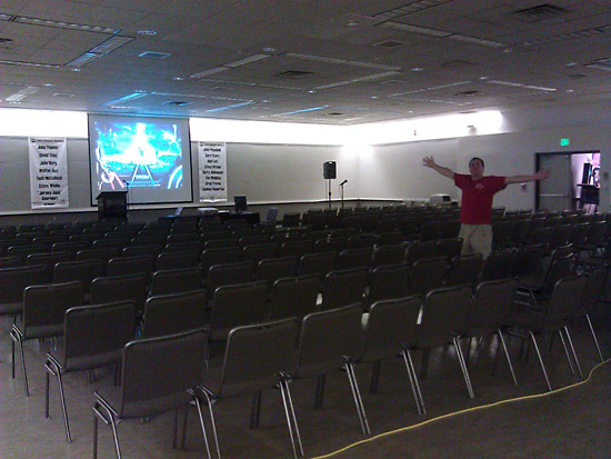 Mike Lorrain basks in the vastness of a soon to be filled seminar room