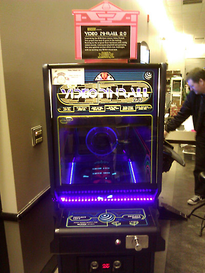 The FIRST Tron Pinball, a video version, based on the original Atari video pinball hardware.  Completely redesigned as a TRON themed game, with graphics and the Legacy toy disc in the back