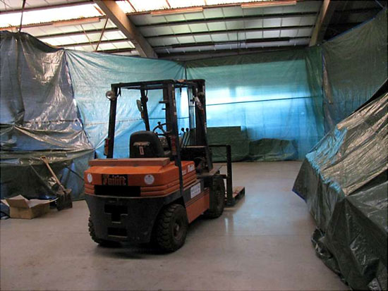 Our forklift came in handy to hang the covers up