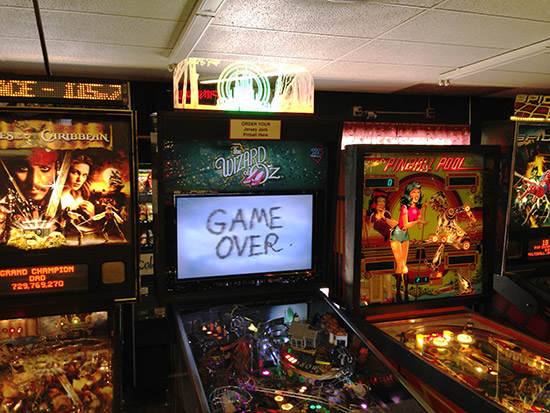 The Wizard of Oz flanked by Pirates of the Caribbean and Pinball Pool