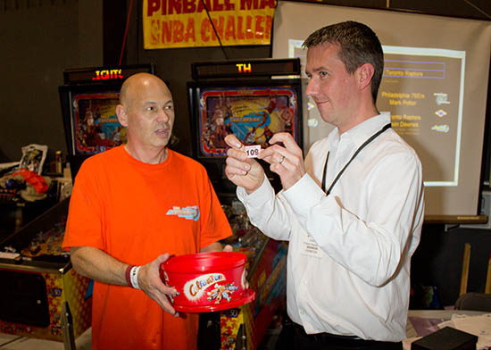 Phil Palmer drew the winning tickets in a raffle for those who brought machines