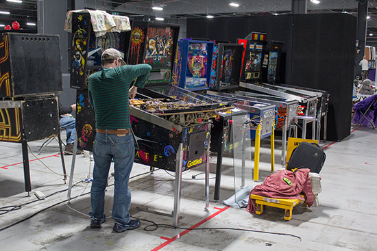 A few of the pinballs being set up