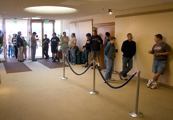 Visitors await the opening of the doors