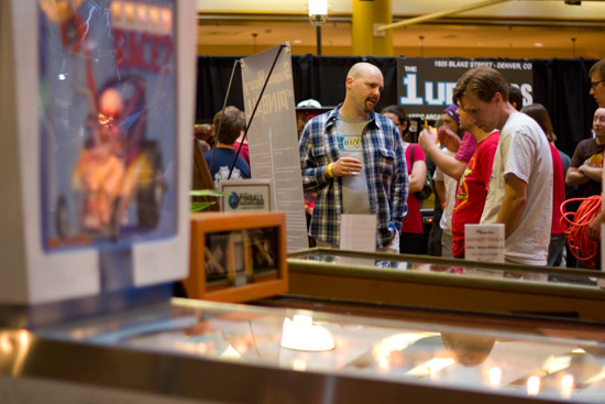 Visitors enjoy the History of Pinball exhibit
