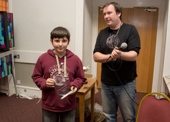 Tim Raison wins one of the Kidz high score competition trophies