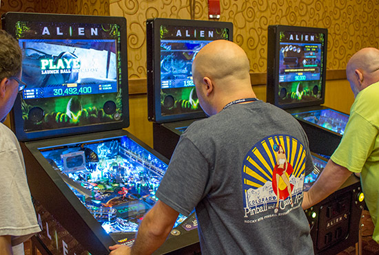 The three Alien Pinball machines in the show hall