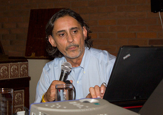 George with his computer at the dinner