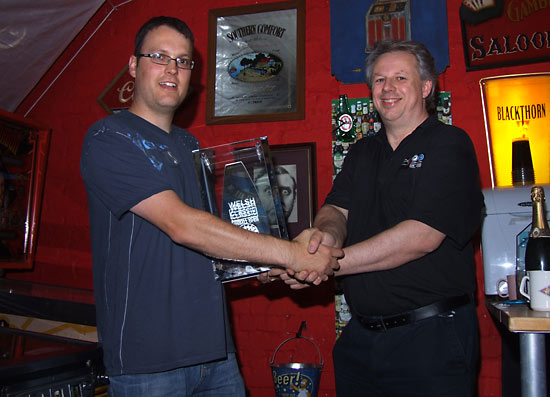 2008 winner Mike Parkins hands Nick the Welsh Classic Pinball Open trophy