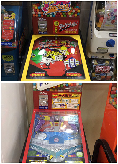 Gumball-dispensing miniature pinballs